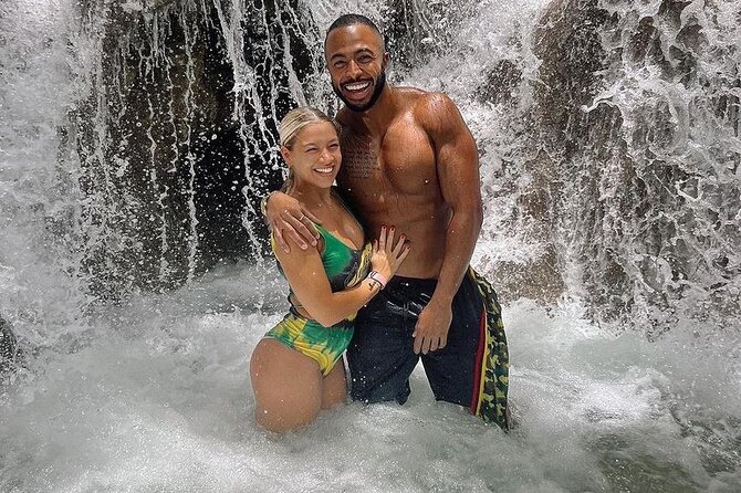 Zipline, Dunn’s River Falls, Bamboo Rafting & Horseback Ride Tour - Ziplining over the waterfalls