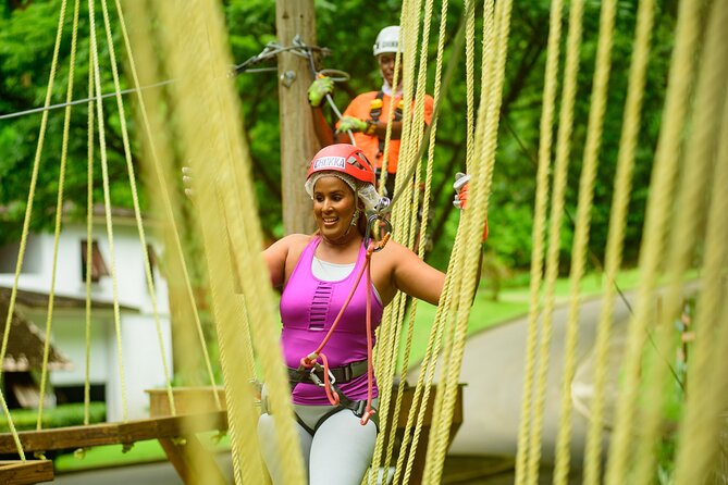 Zipline Experience & Obstacle Course at Harrison's Cave by Chukka - Learning about rum at the Mount Gay exhibit