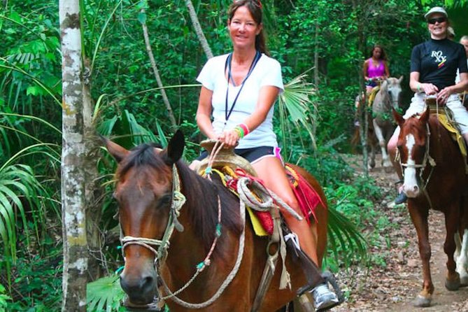 Ziplining and Horseback Riding Experience from Cancun and Playa del Carmen - Flying across the trees on the zipline circuit